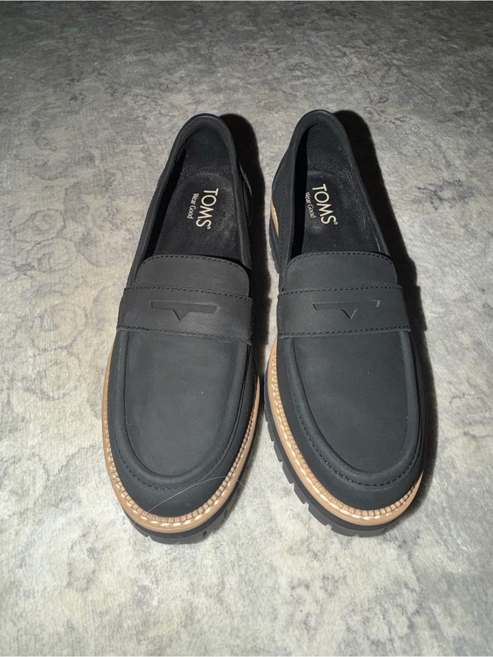 TOMS Black Penny Loafers with Tan Trim